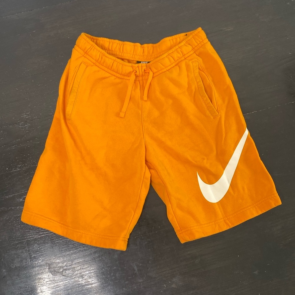 Nike Orange Shorts with White Swoosh